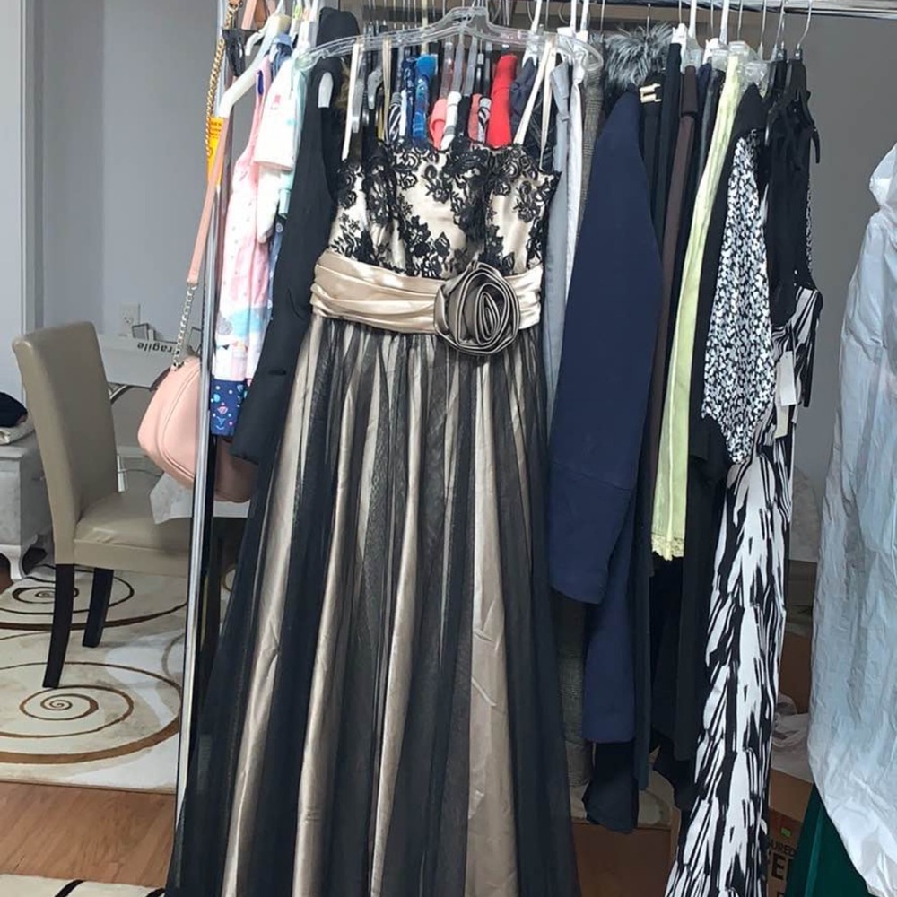 Elegant Black and Gold Gown with Floral Lace